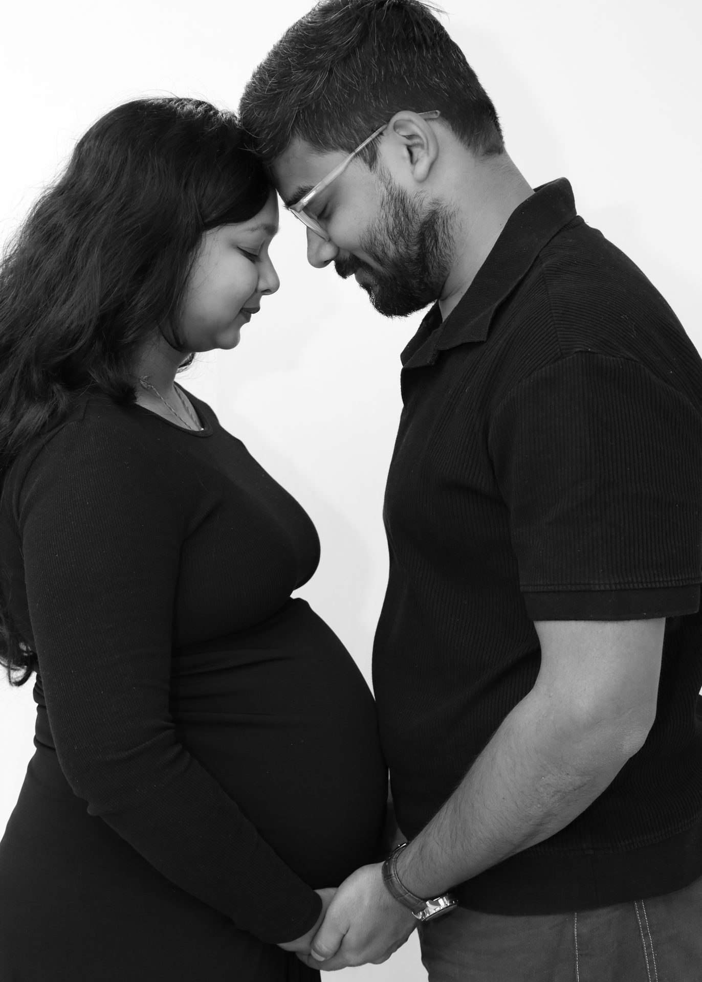 Maternity - couple facing